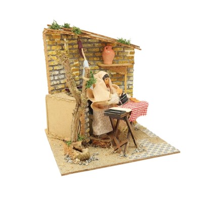 Pastore per Presepe in Movimento 17x17 cm Donna che Stira