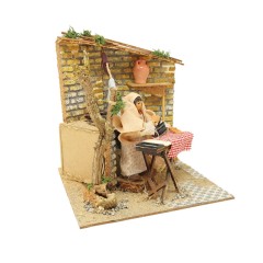 Pastore per Presepe in Movimento 17x17 cm Donna che Stira